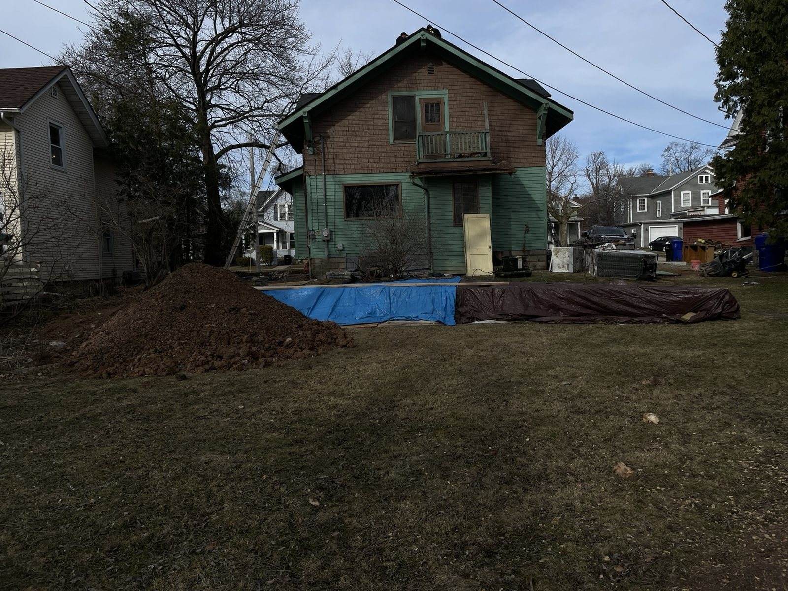 During construction: rear exterior and marked excavation area at the Appleton site.